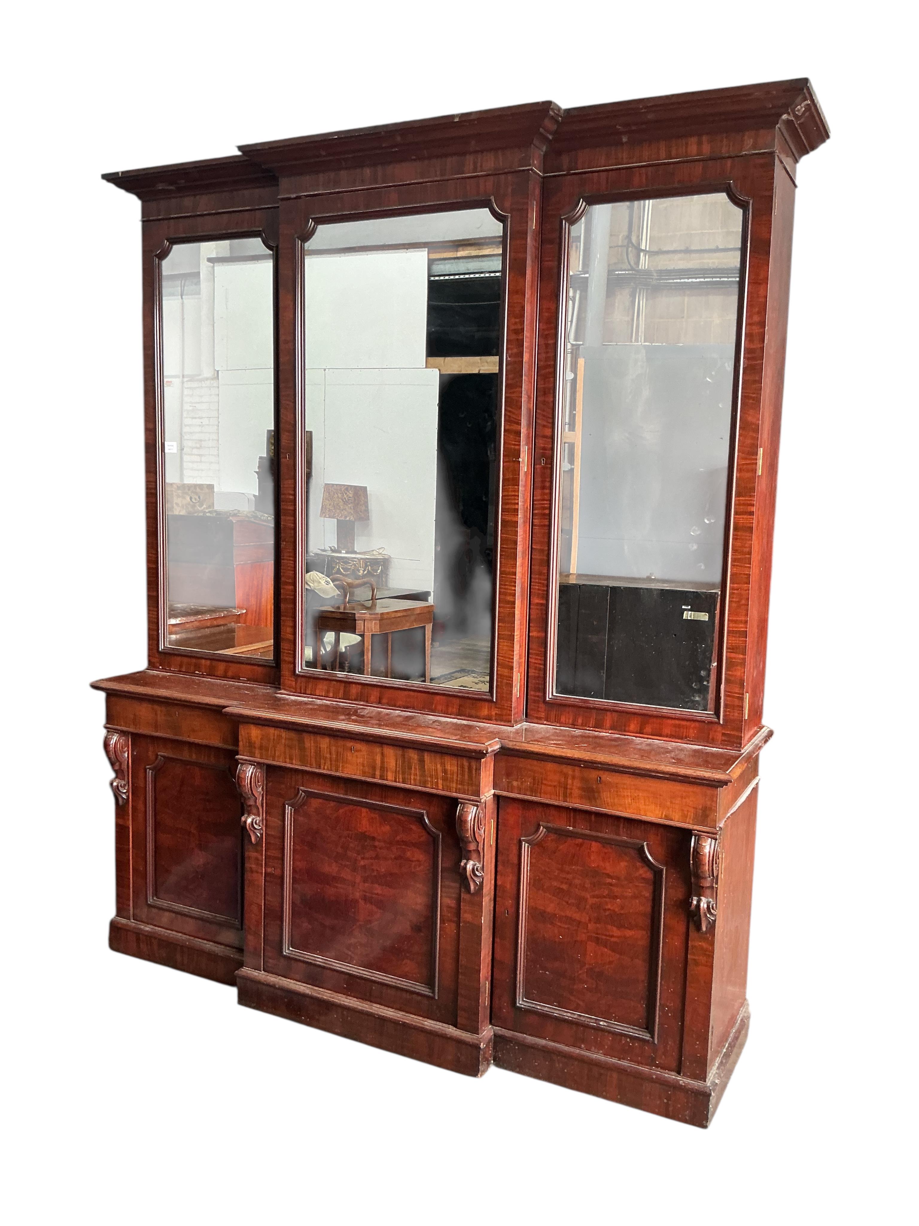 A Victorian mahogany breakfront library bookcase, width 200cm, depth 54cm, height 238cm